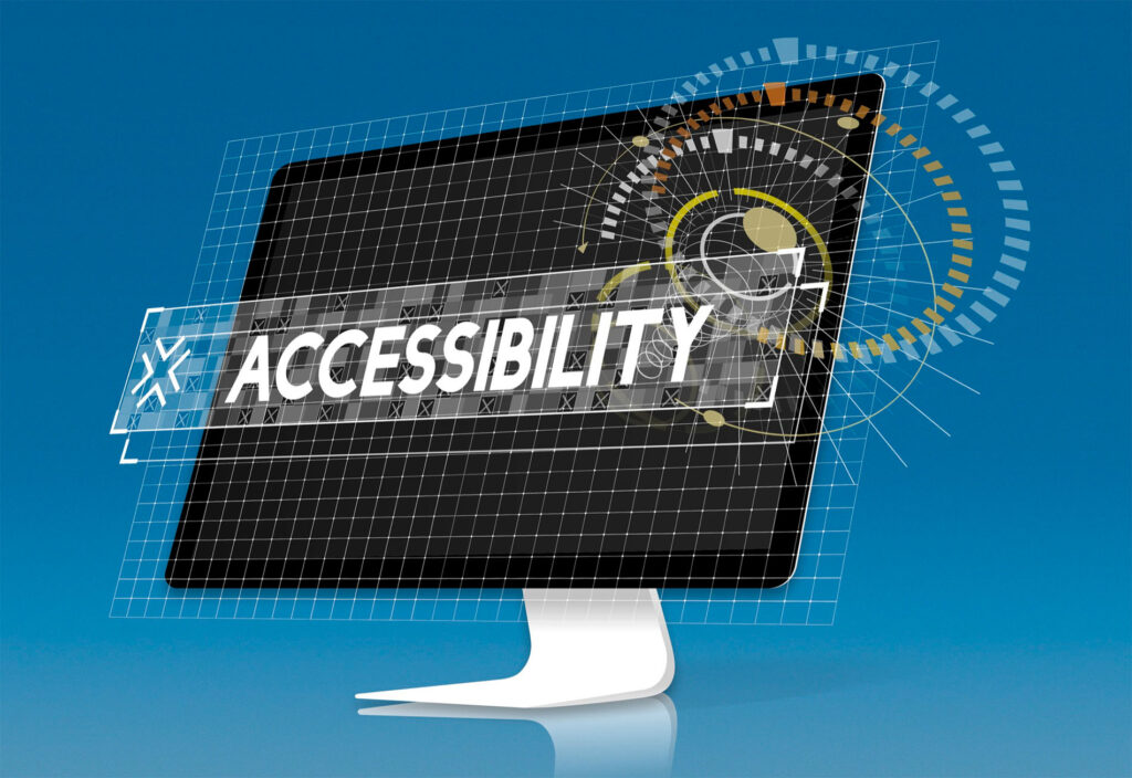 Pantalla de ordenador con diseño digital y la palabra 'Accessibility' en grande, simbolizando accesibilidad web mediante gráficos tecnológicos y rejillas